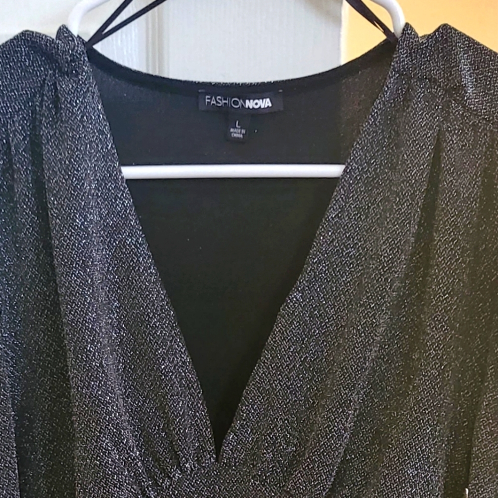 Glitzy long sleeve body suit